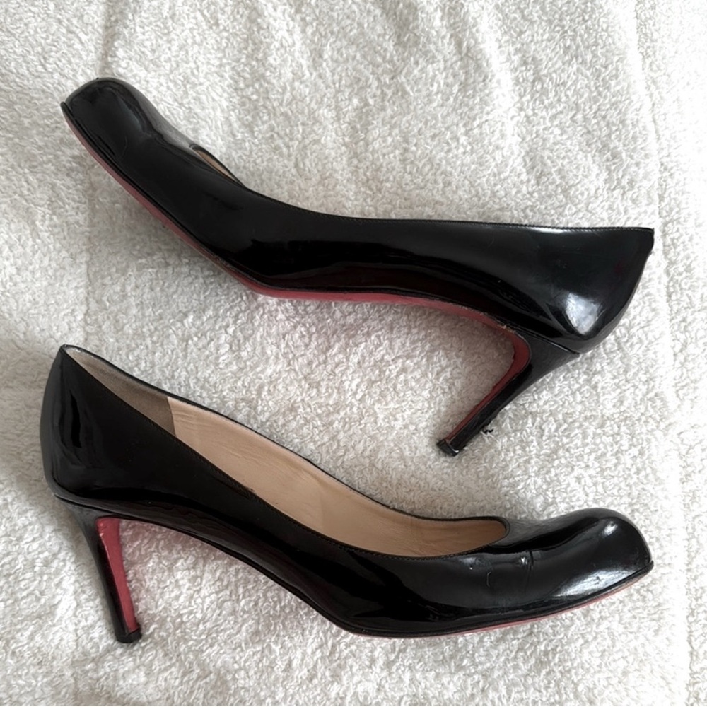 Christian Louboutin Black Heels with Signature Red Soles
